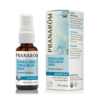 Pranarom Aromacalm Room and Linen Stress Relief Spray, in a 1 fl. oz. glass amber bottle with a chic blue and white label.