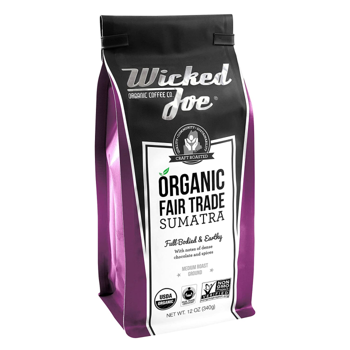 A purple and black bag of Wicked Joe Organic Fair Trade Sumatra coffee. With a craft roasted seal.